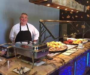 chef behind the cutting station